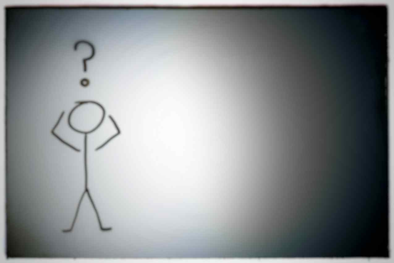 A hand-drawn stick figure with a question mark over its head.