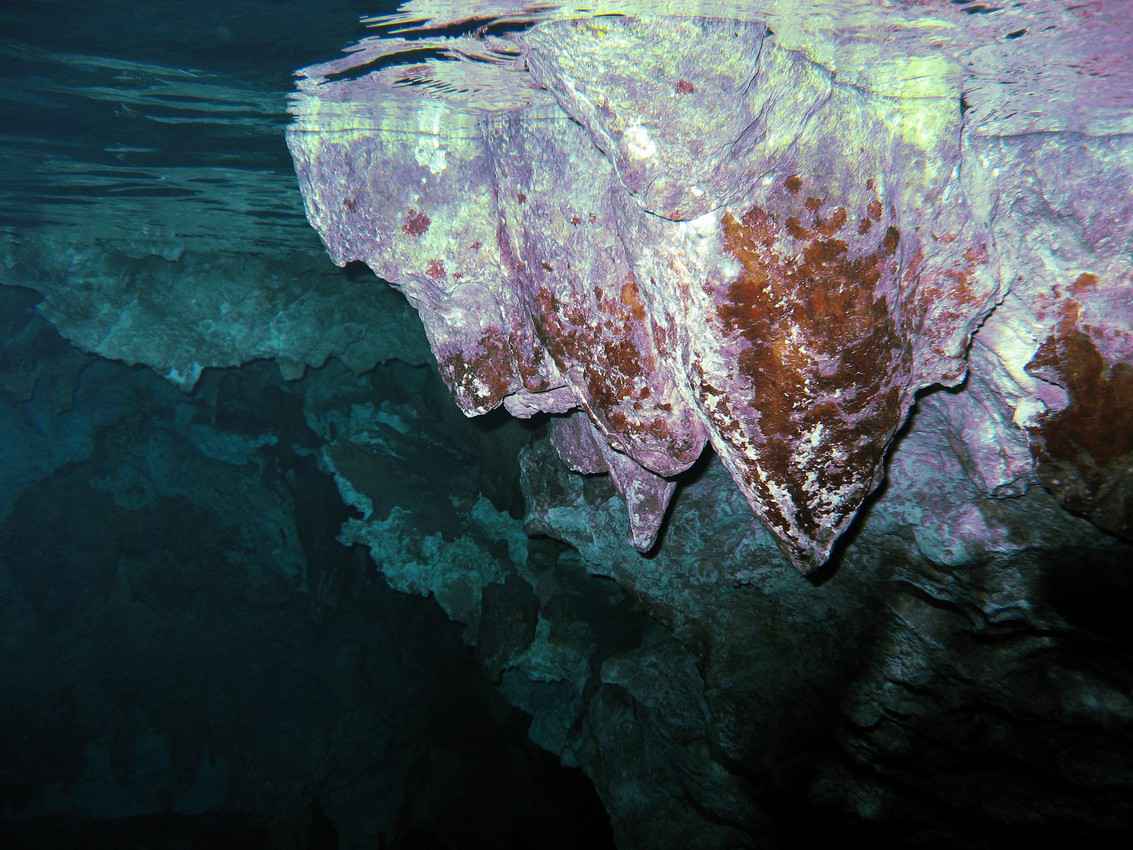 Visible stalactites and stalagmites in a cave near Playa Del Carmen.
