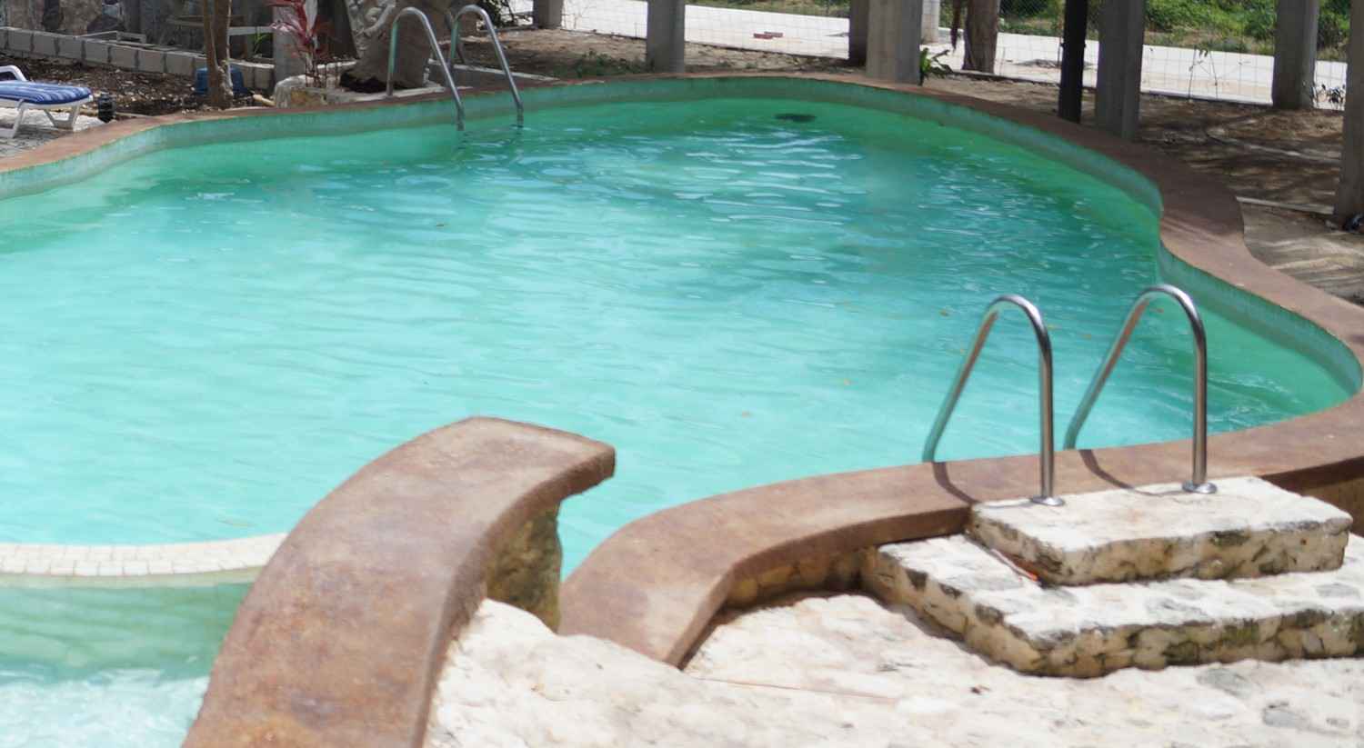 A swimming pool at a cheap hotel in Playa Del Carmen.
