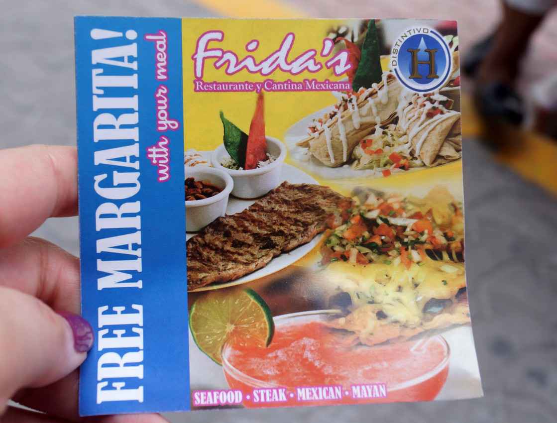 A coupon offering a free margarita with your meal at a Frida's restaurant.