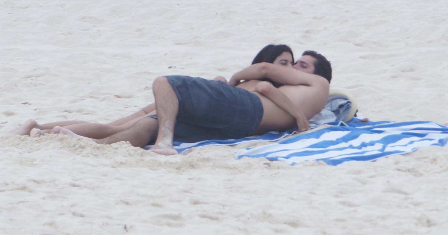 A man and a woman who were kissing on the beach in Playa Del Carmen.