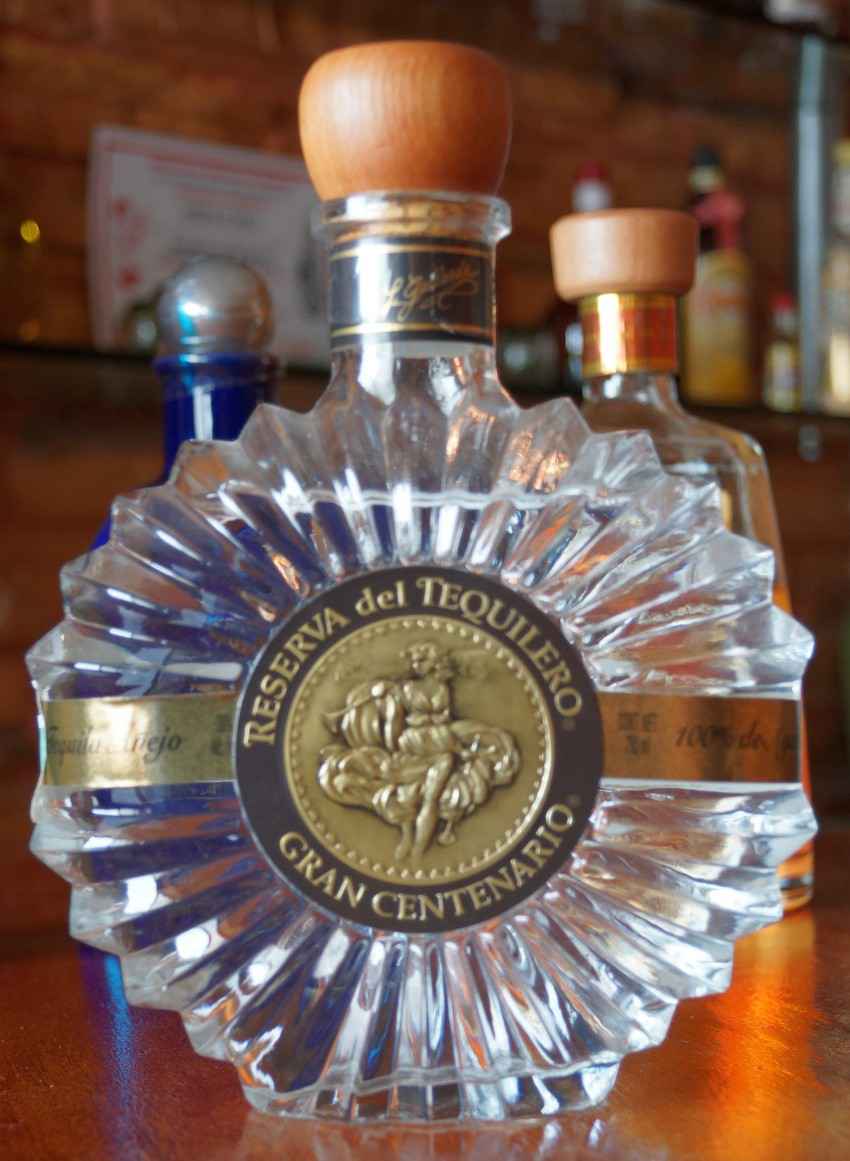 A bottle of Reserva Gran Centenario tequila.