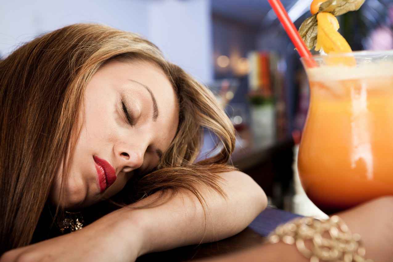 A woman at a bar who was knocked out from sleeping pills in her drink.
