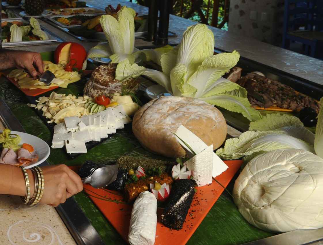 You will need to decide between multiple cheeses and bread at buffets in Playa Del Carmen's all-inclusive resorts.