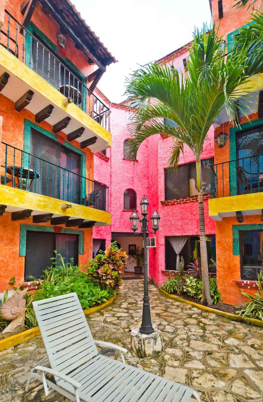 Several lollipop colored apartments for rent in Playa Del Carmen.