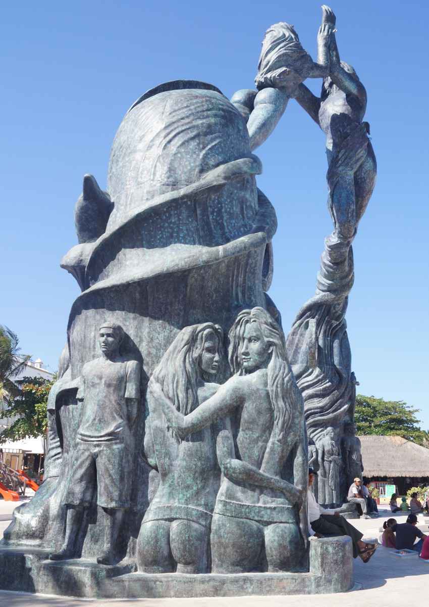 side-view-of-statue-on-beach-in-playa-del-carmen