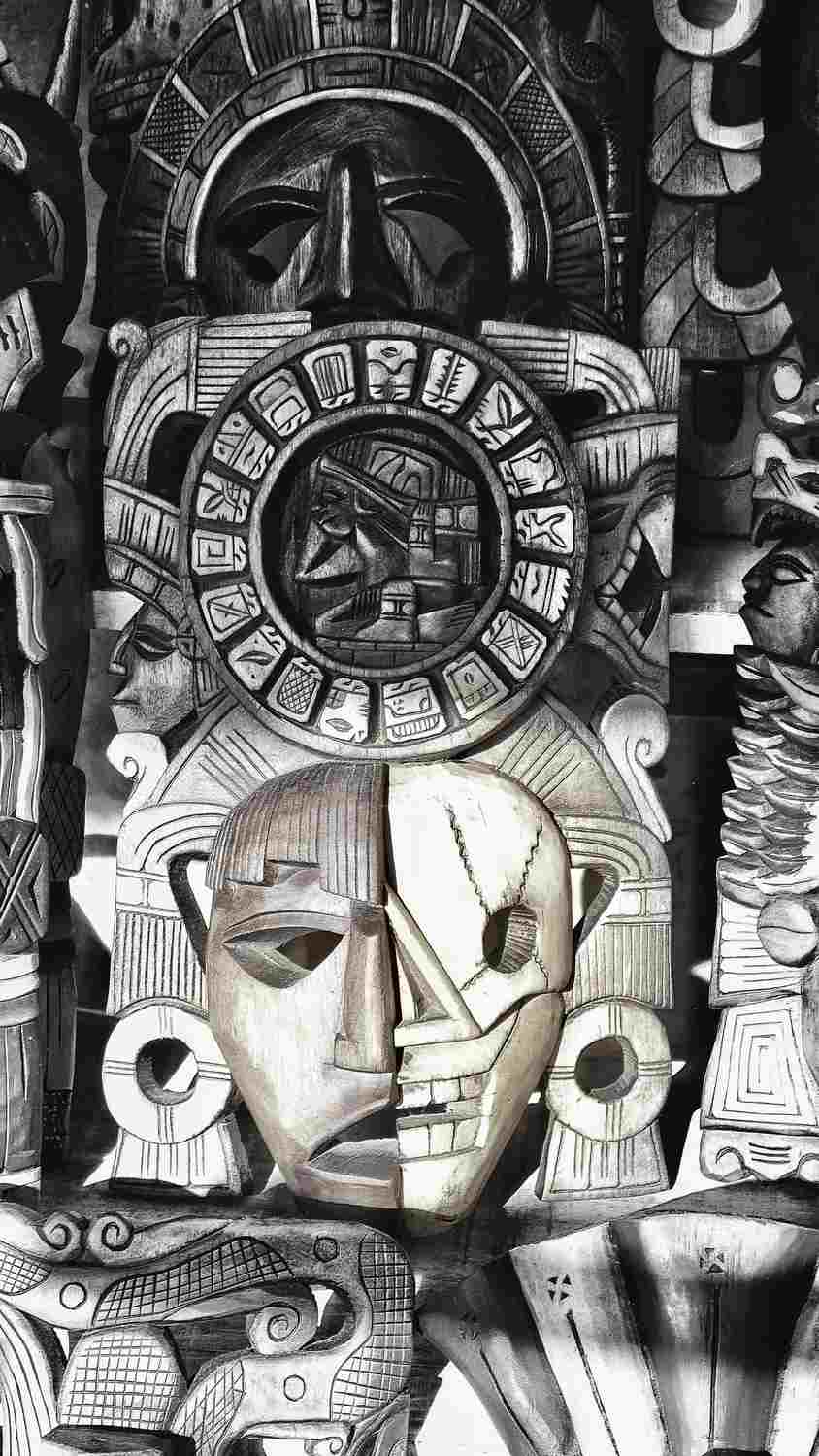 Artistic Mayan face carvings.