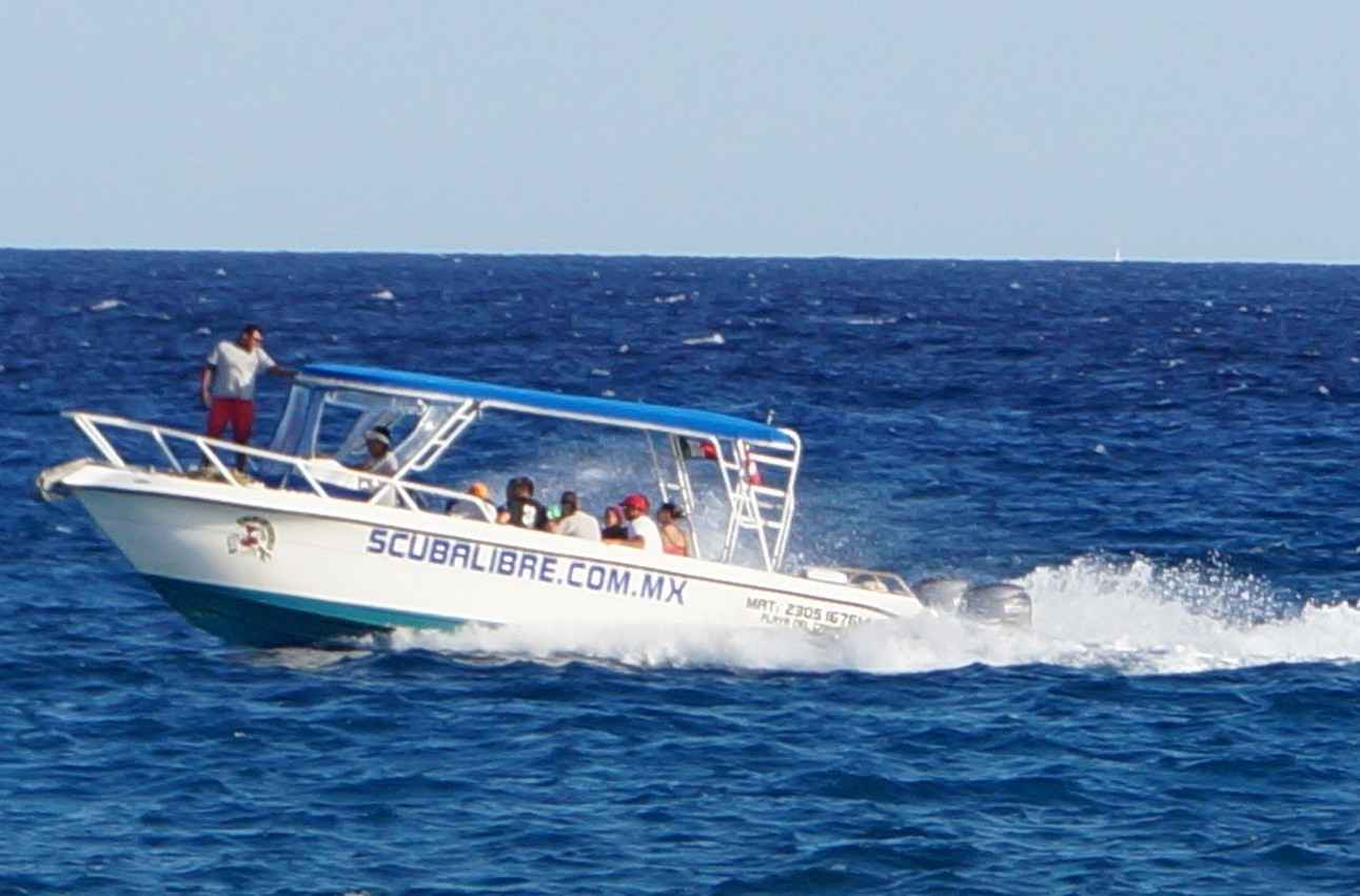 A scuba diving boat near the Playa Del Carmen shoreline.