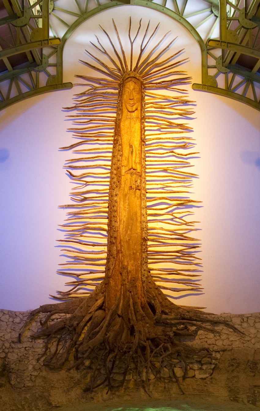 A Mayan Christian tree with deep roots in a church.