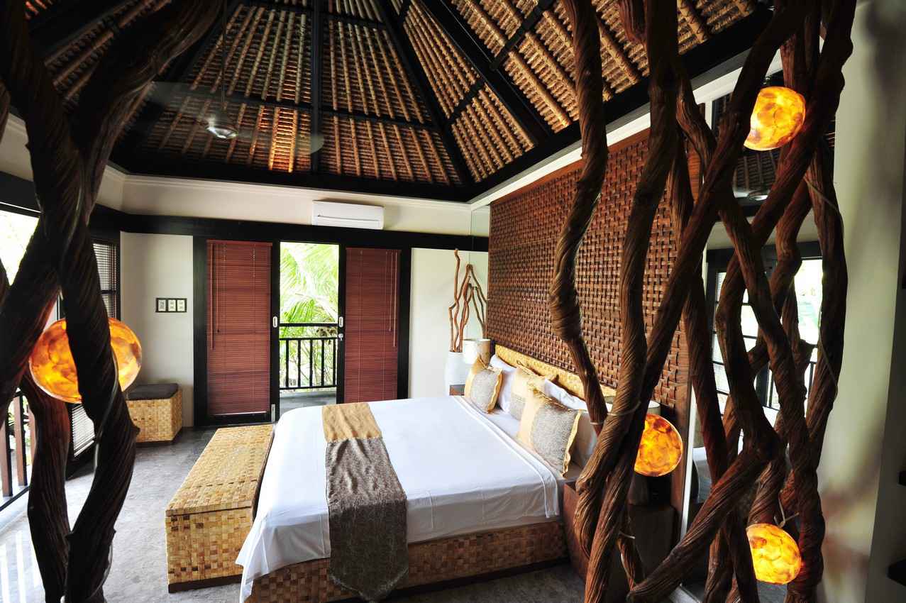 A nature friendly resort room overlooking the city and jungle in Playa Del Carmen.