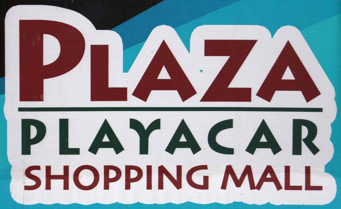 Plaza Playacar shopping mall sign.
