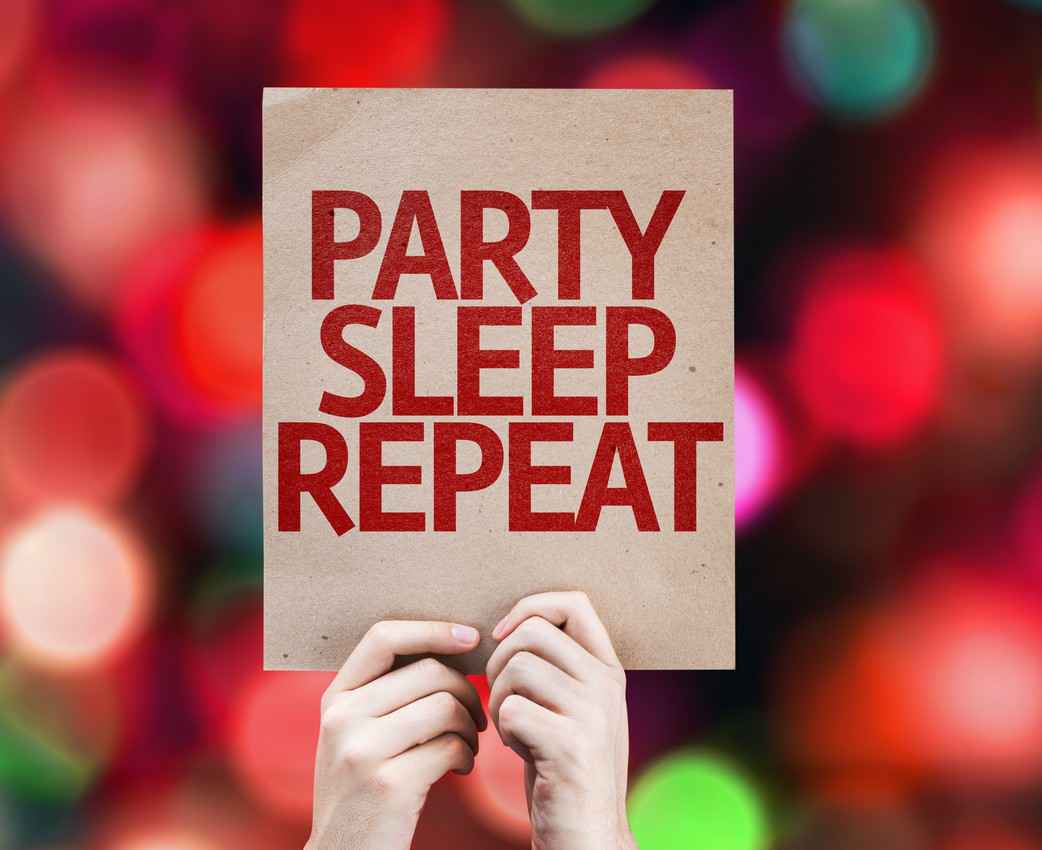 A sign that reads PARTY, SLEEP, REPEAT.