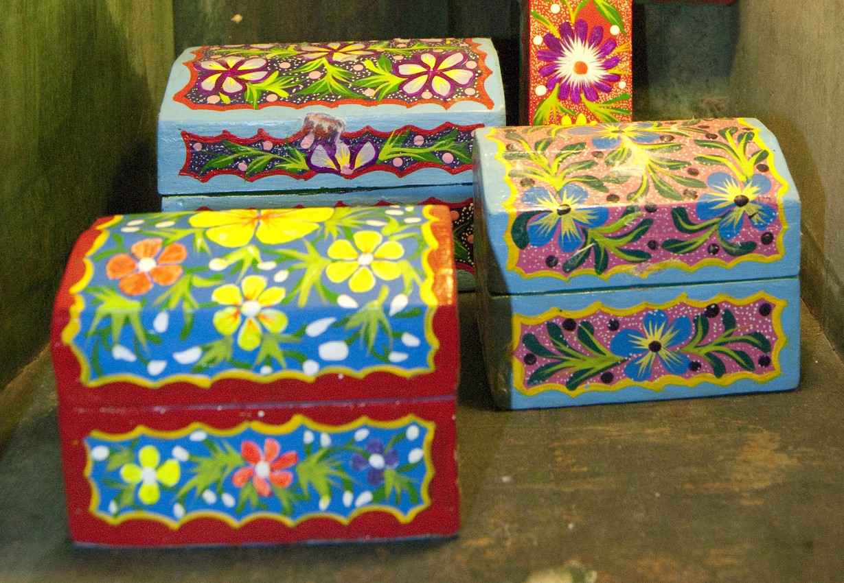 Several hand-painted wooden boxes for sale on Fifth Avenue.