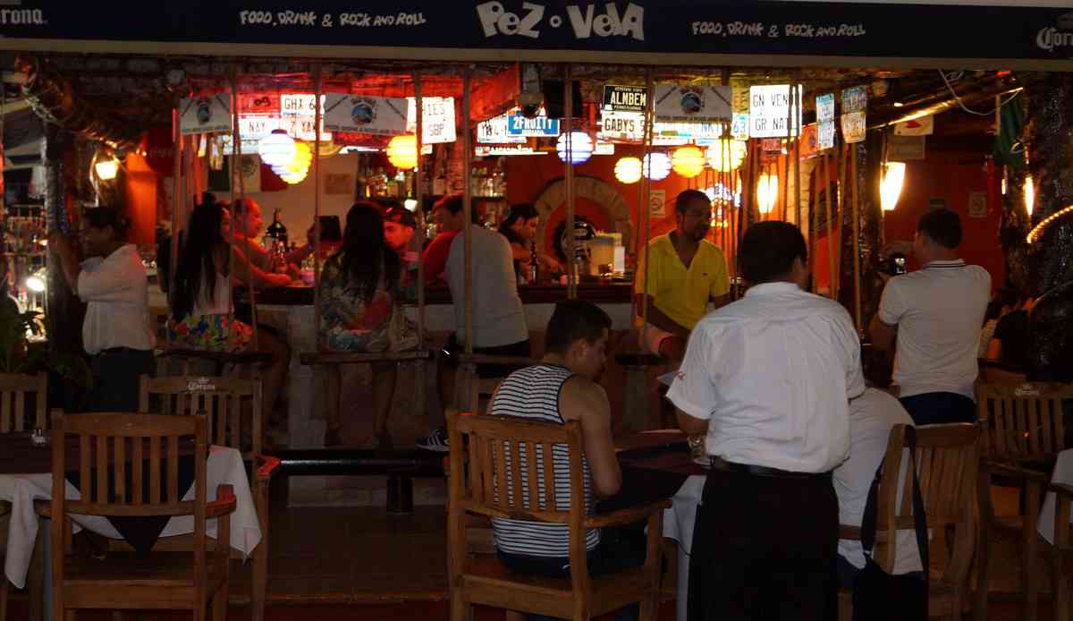 Pez Vela bar featuring swings instead of traditional barstools.