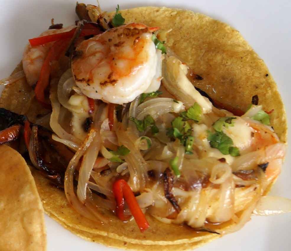 A shrimp and vegetable taco at a restaurant in Playa Del Carmen.