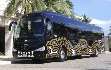 The transfer bus that runs from Cancun to Playa Del Carmen.