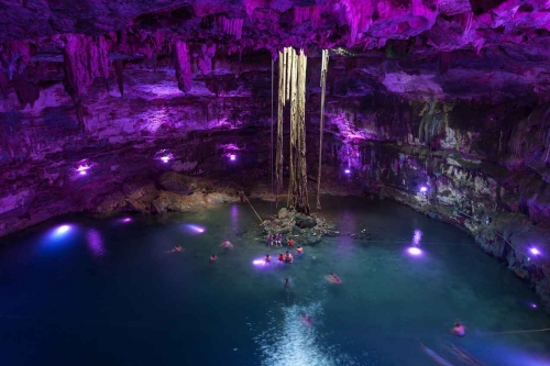 Inside a cenote with amazing artificial lighting.