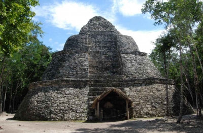 A midsized Mayan pyramid at an archaeological site.