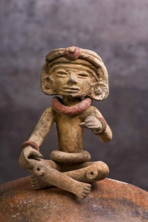 A miniature Mayan statue found at some ruins near Playa Del Carmen.