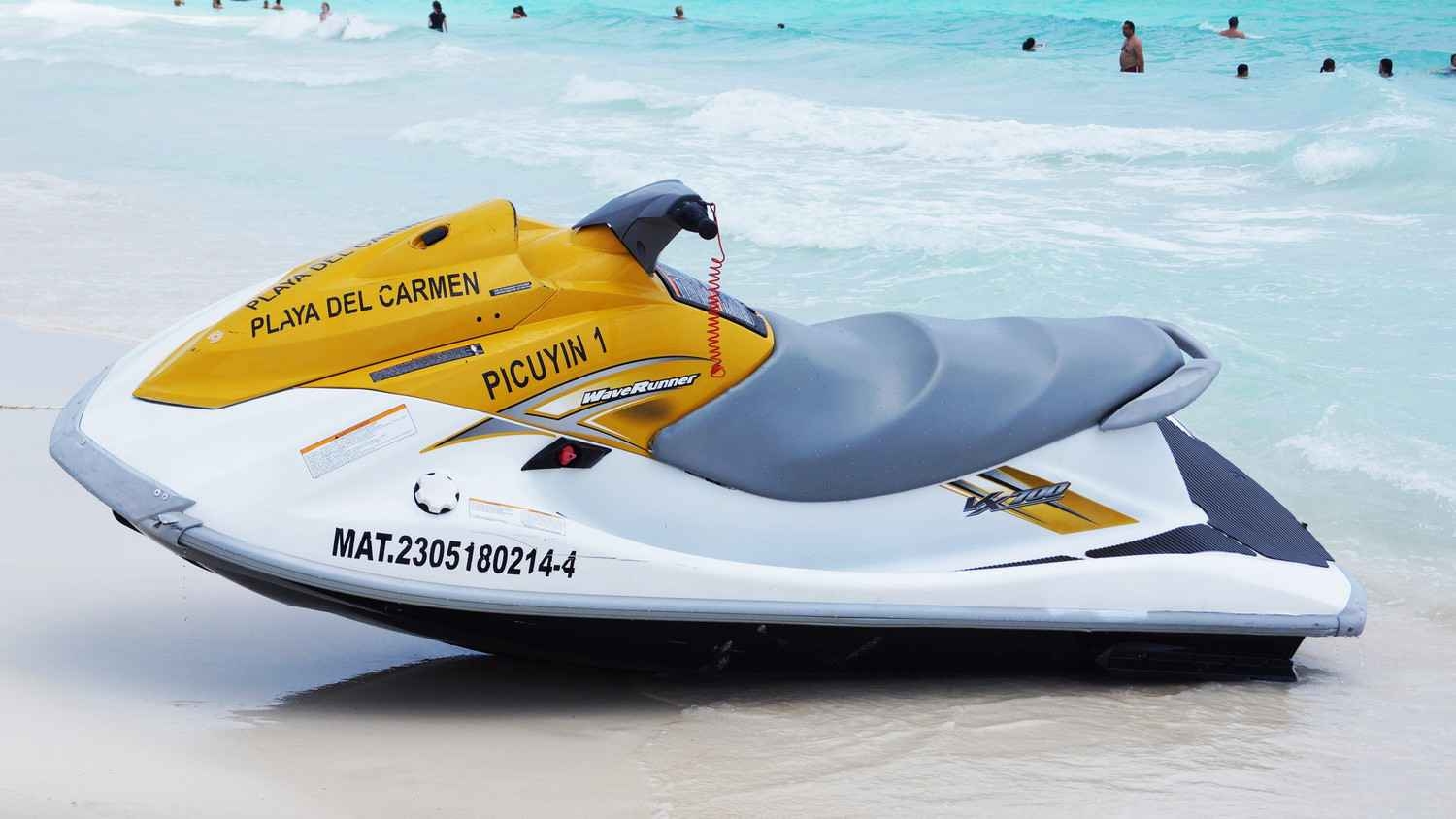 A jet ski for rent on the beach.