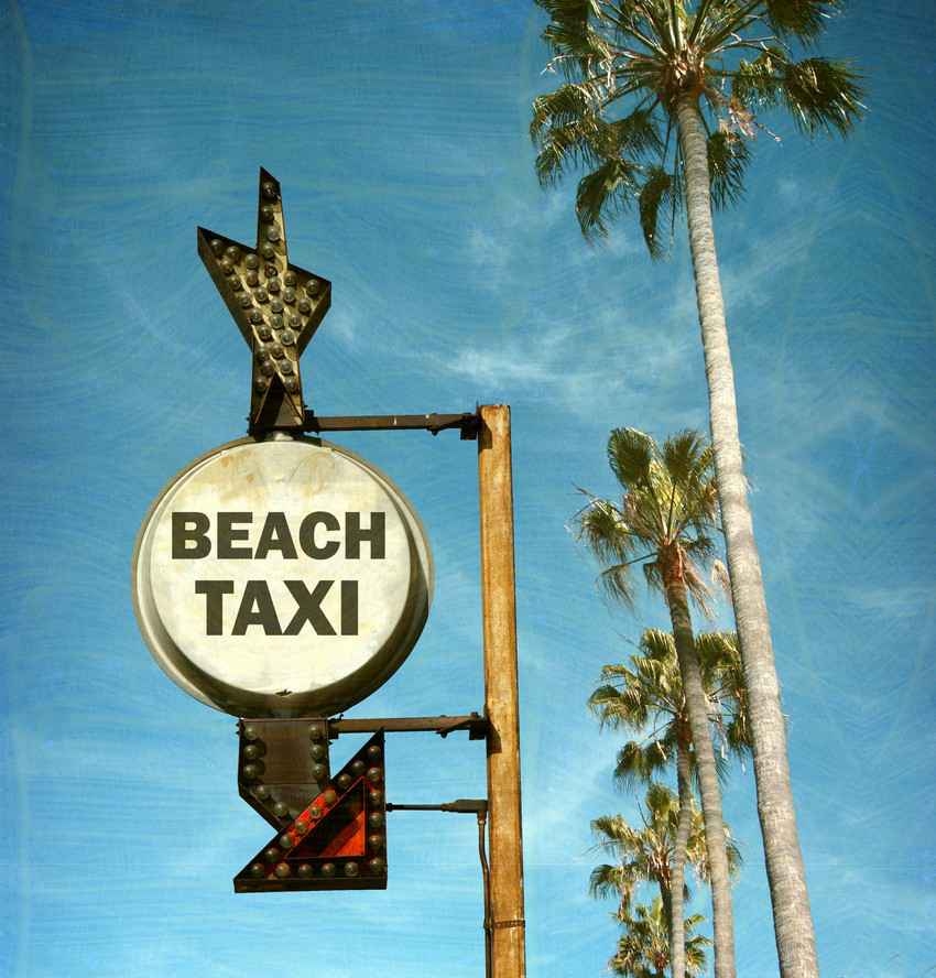 A beach taxi sign in Playa Del Carmen.