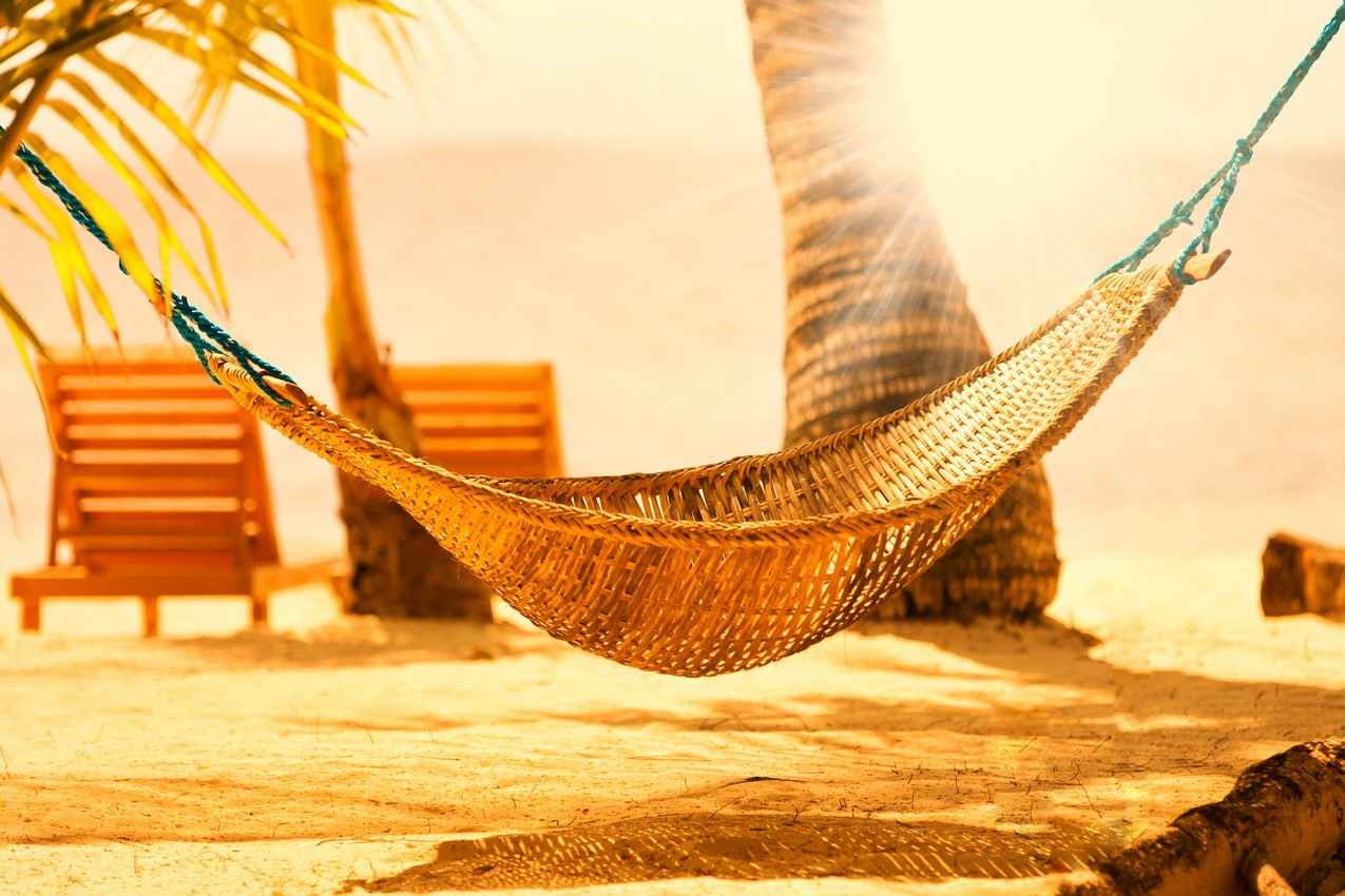 A handwoven hammock on a Playa Del Carmen beach.