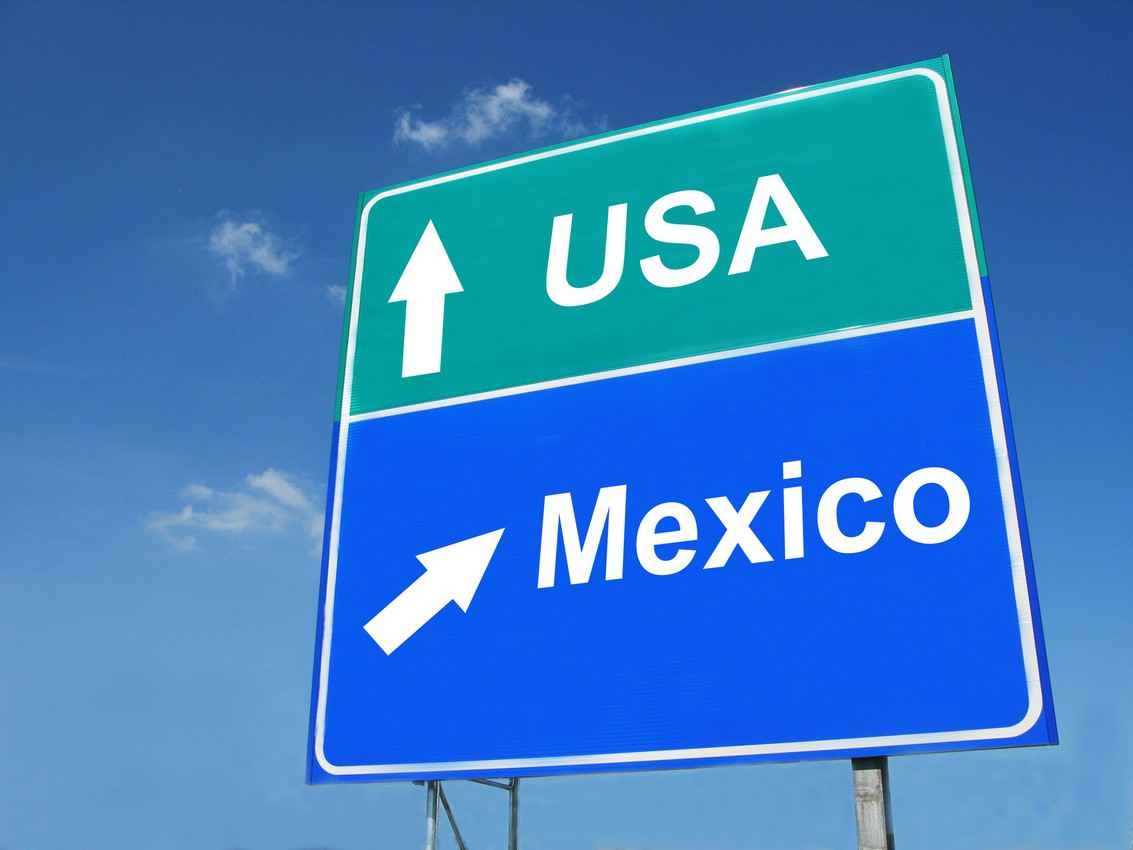 USA-Mexico direction sign.