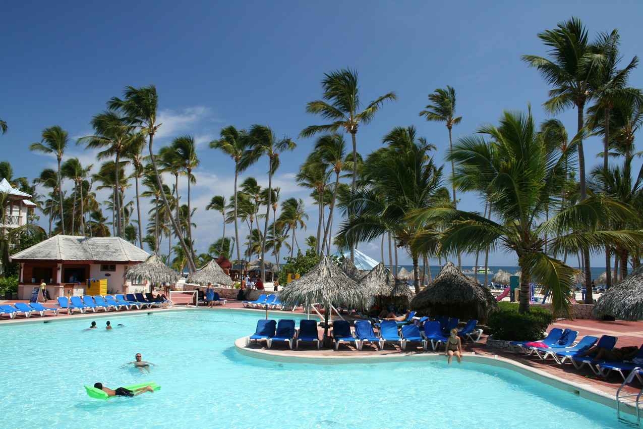A large swimming pool near the beach at a five-star resort.