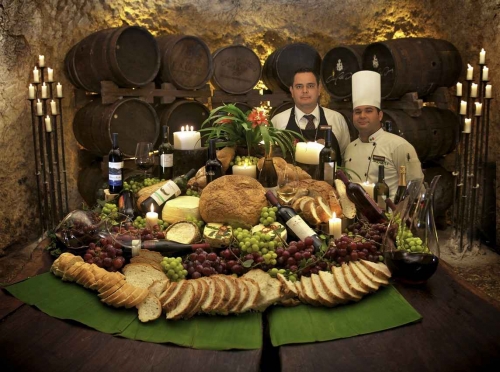 A table with food inside the winery at Xcaret.